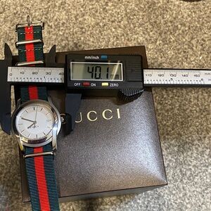 Gucci Silver Timepiece with Multicolor Strap